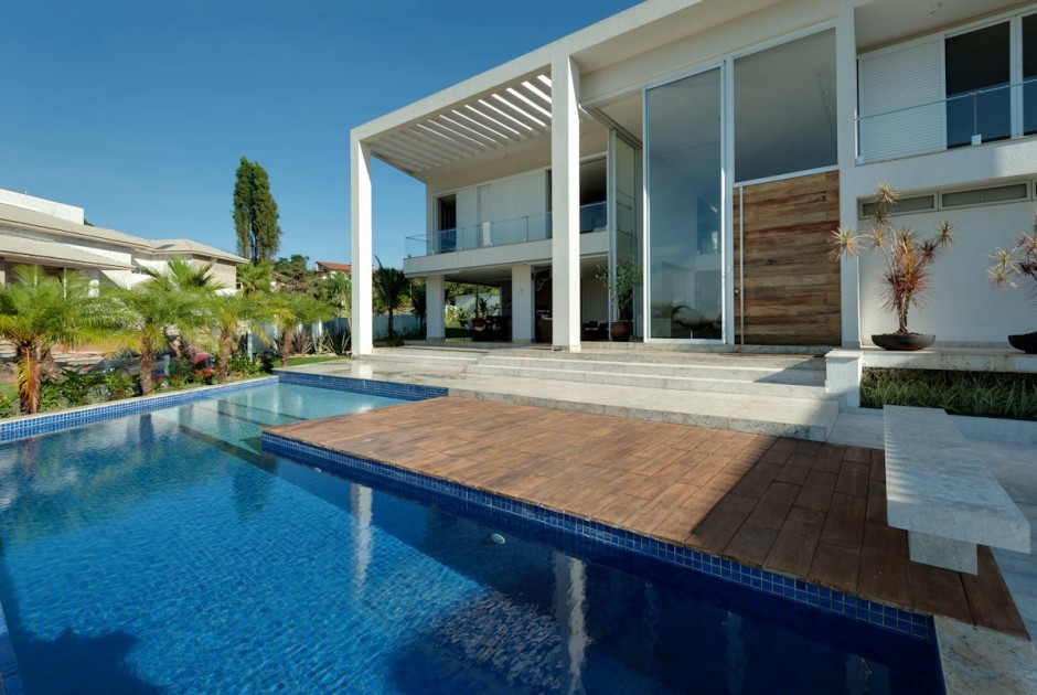 Front facade and swimming pool during the day