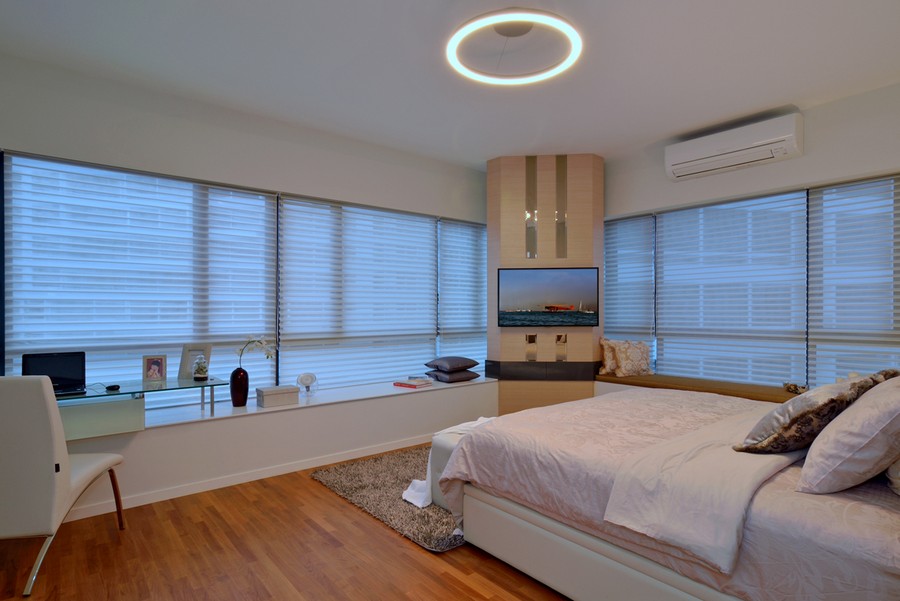 Elegant bedroom in bright apartment by KNQ Associates