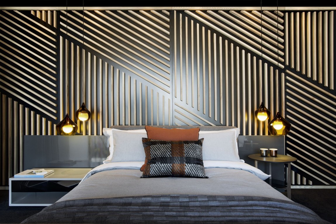 Bed and wall design in small apartment by SAOTA, De Waterkant, Cape Town