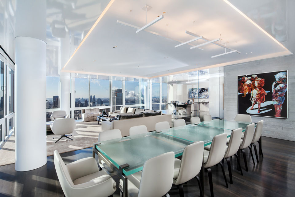 Glass dining table in modern apartment