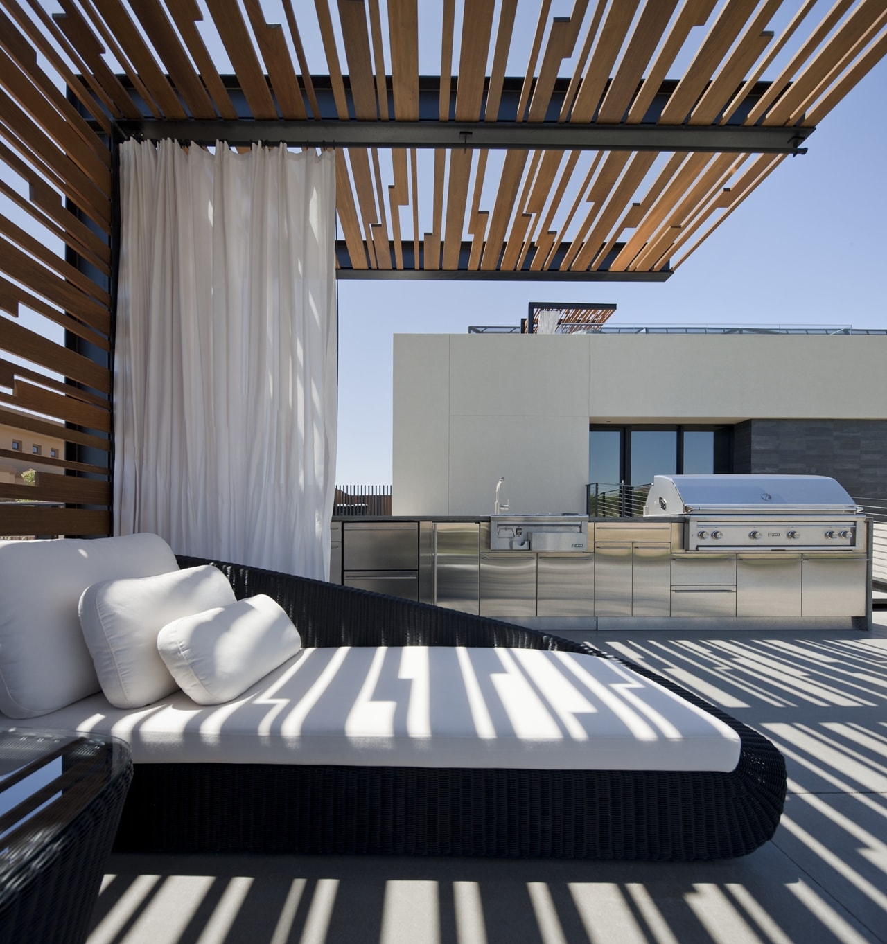 Outdoor furniture in modern desert house designed by assemblageSTUDIO