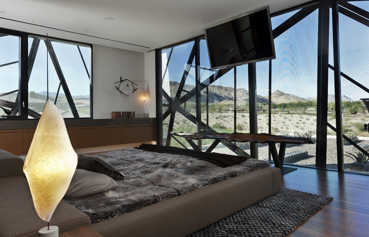 Contemporary bedroom in modern desert house designed by assemblageSTUDIO