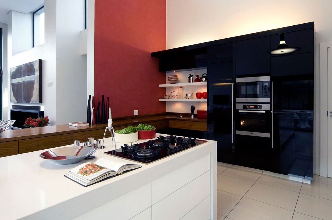 Modern kitchen in Mosi residence by Nico van der Meulen Architects