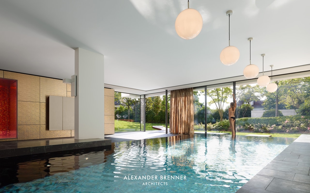 Indoor swimming pool in modern villa by Alexander Brenner