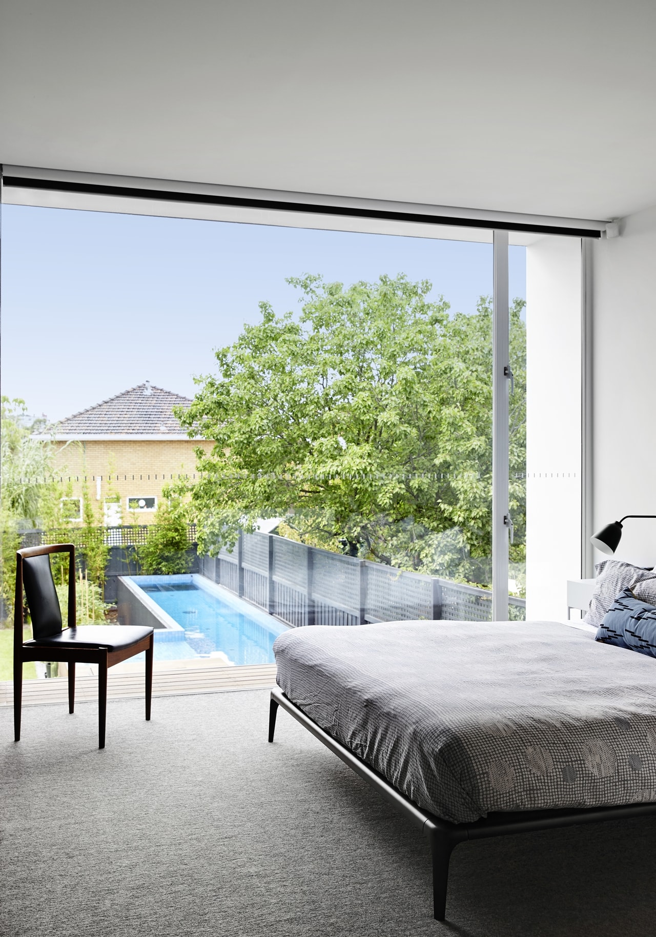 Bedroom glass wall by Austin Maynard Architects
