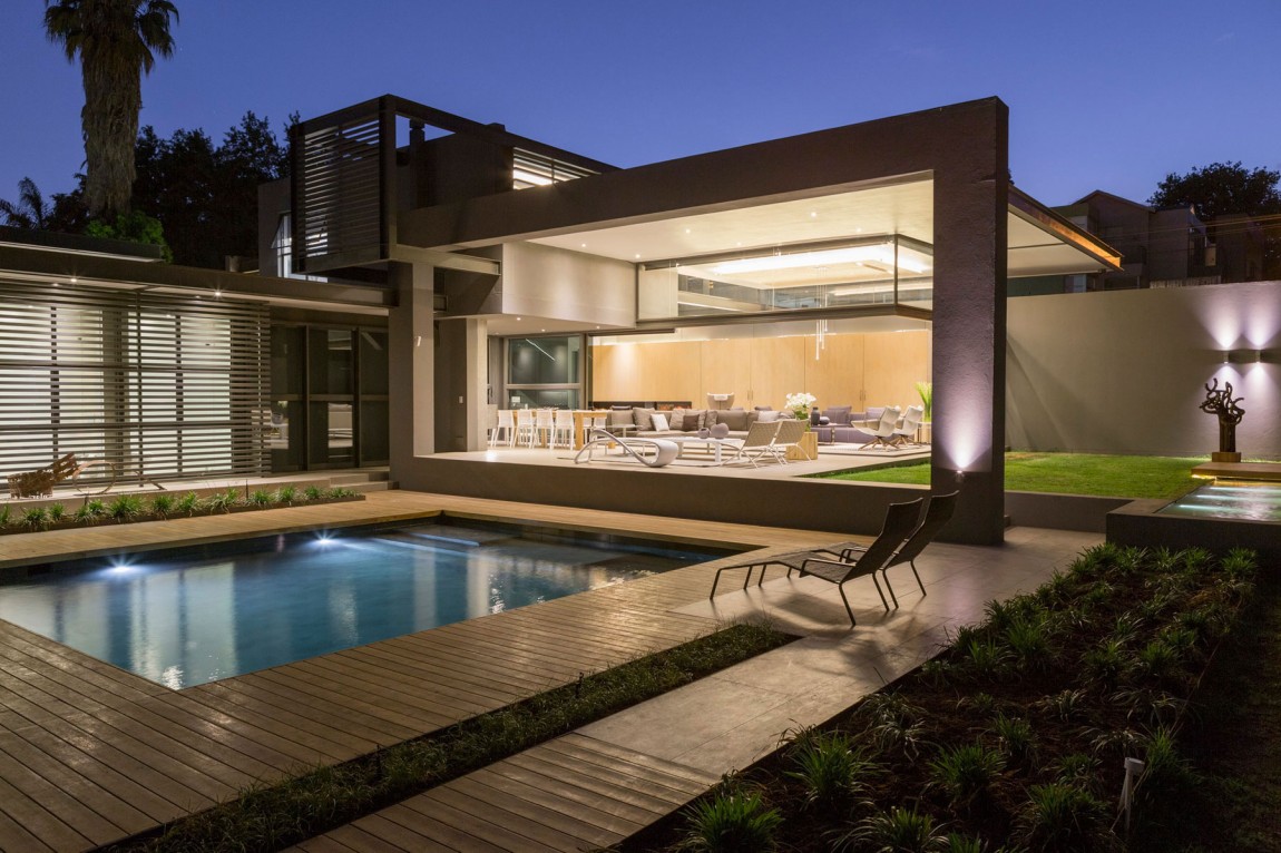 Open terrace of House Sar by Nico van der Meulen Architects at night