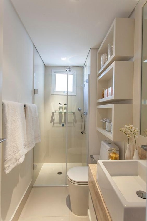 walk in shower in small bright bathroom