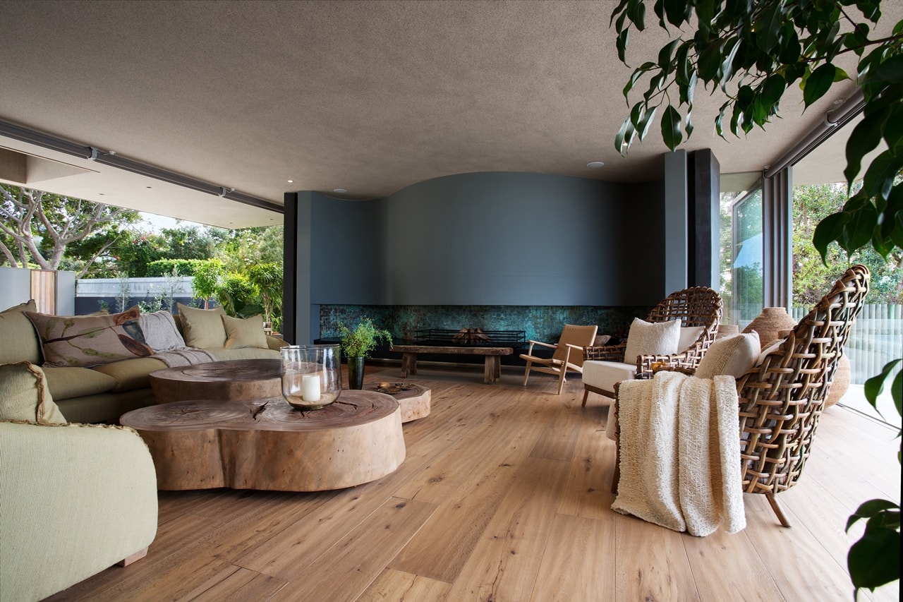 Amazing living room in modern home with wooden facade by SAOTA