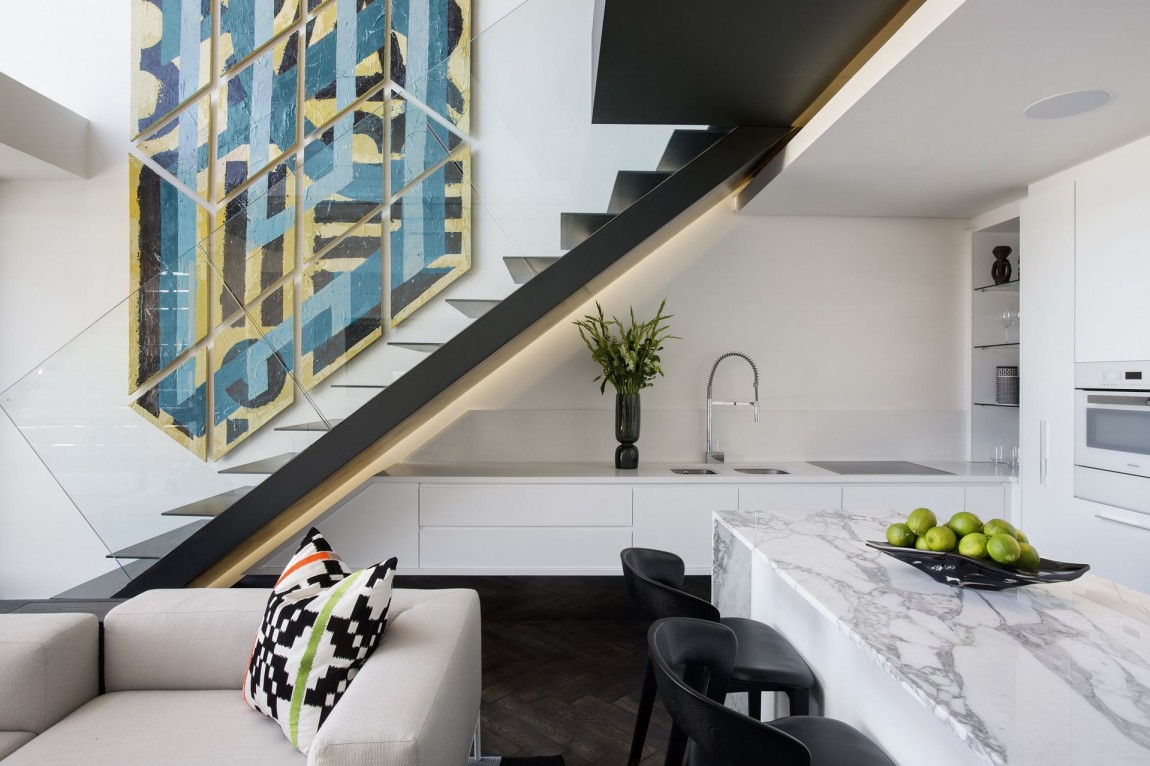 Small kitchen placed under staircase