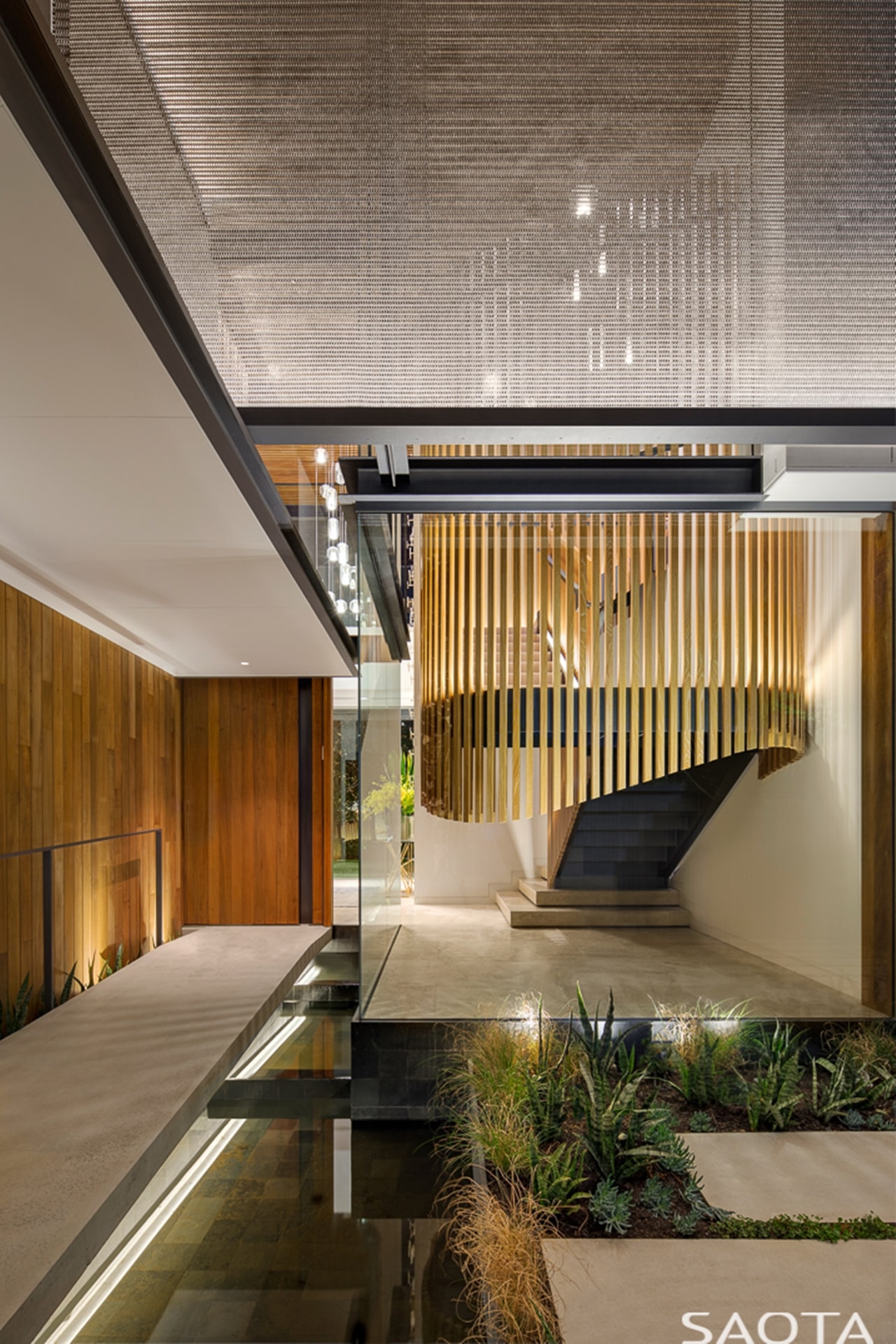 Modern entrance at night as part of amazing house design on Double Bay residence by SAOTA
