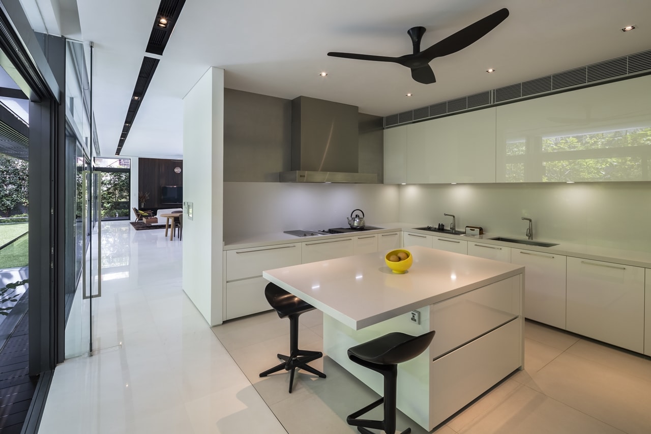 Minimalist kitchen design in modern mansion designed by Wallflower Architecture and Design