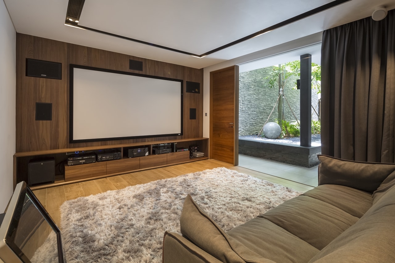 Home theater in modern mansion designed by Wallflower Architecture and Design