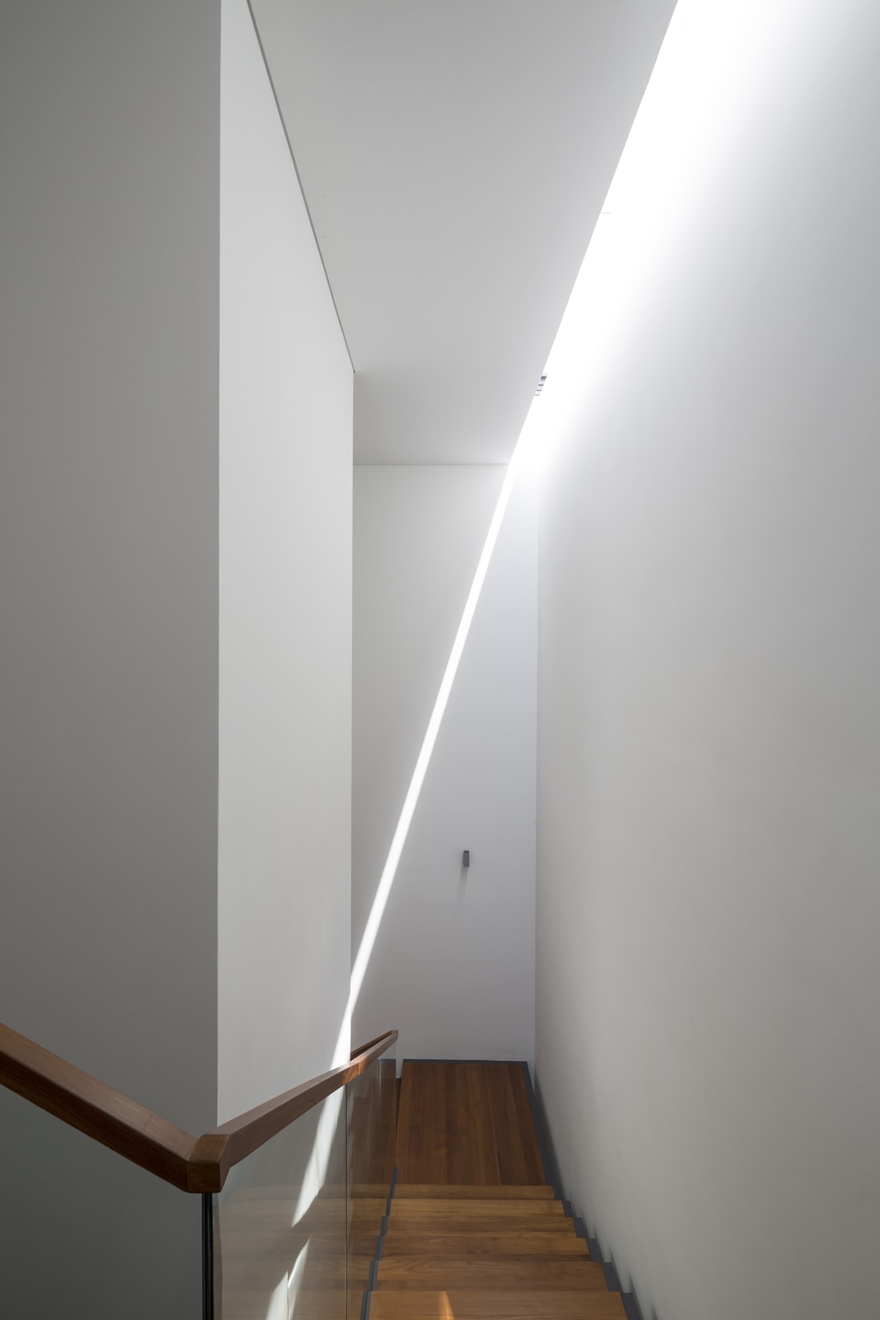 Hallway skylight in modern mansion designed by Wallflower Architecture and Design