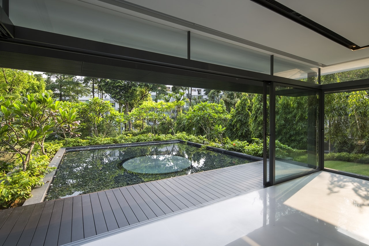Tropical garden design in modern mansion designed by Wallflower Architecture and Design