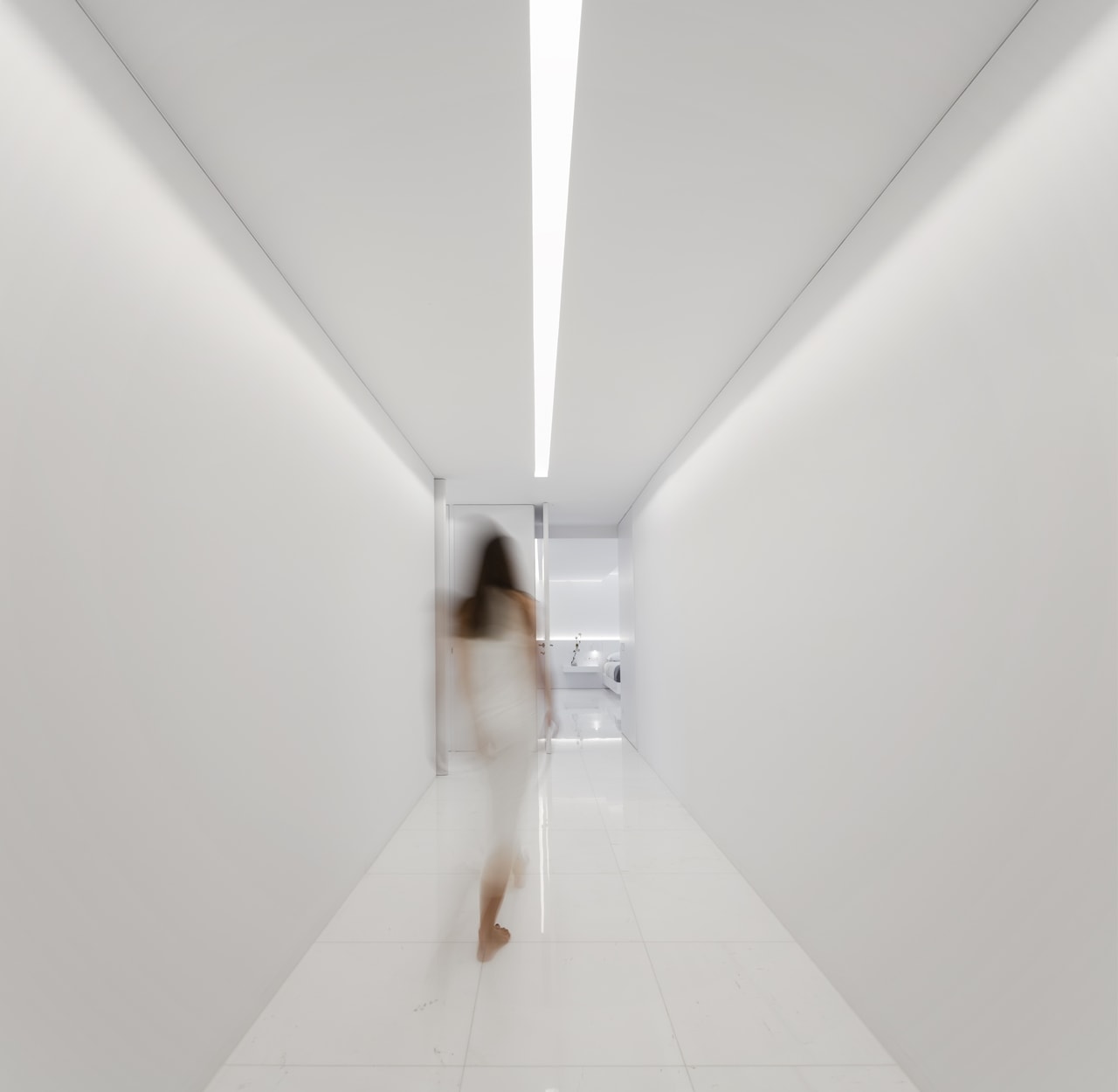 All white interior in minimalist house designed by Fran Silvestre Architects