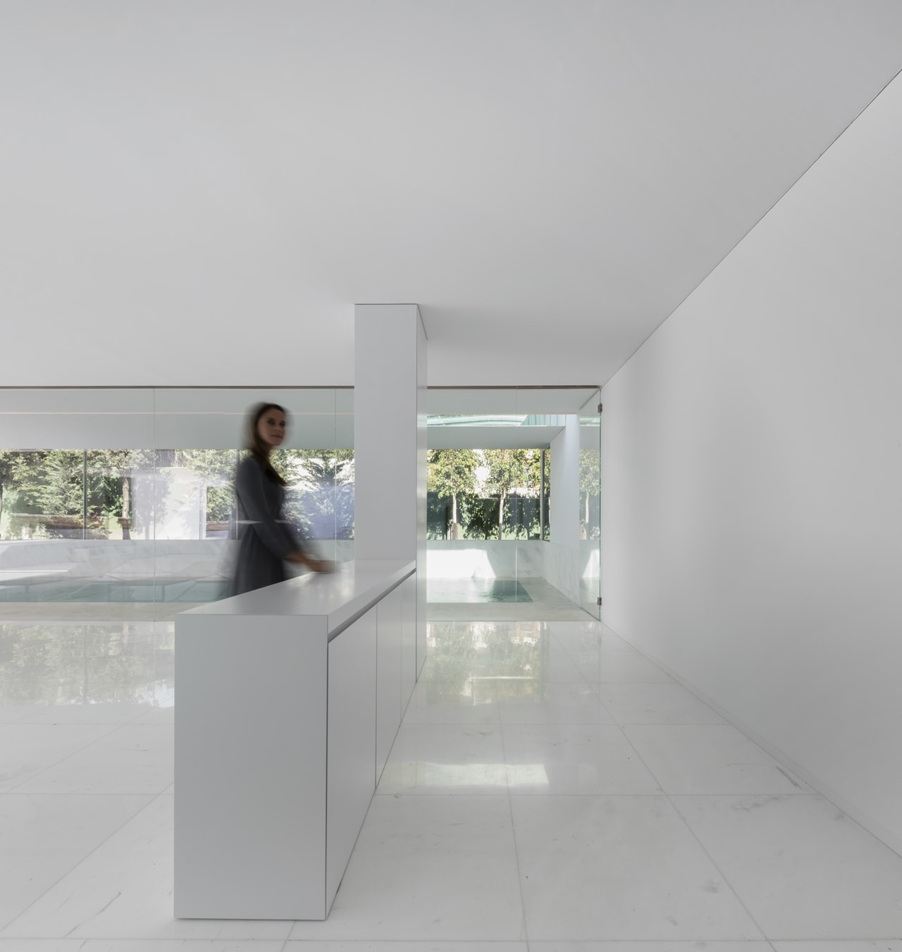 White interior in minimalist house designed by Fran Silvestre Architects
