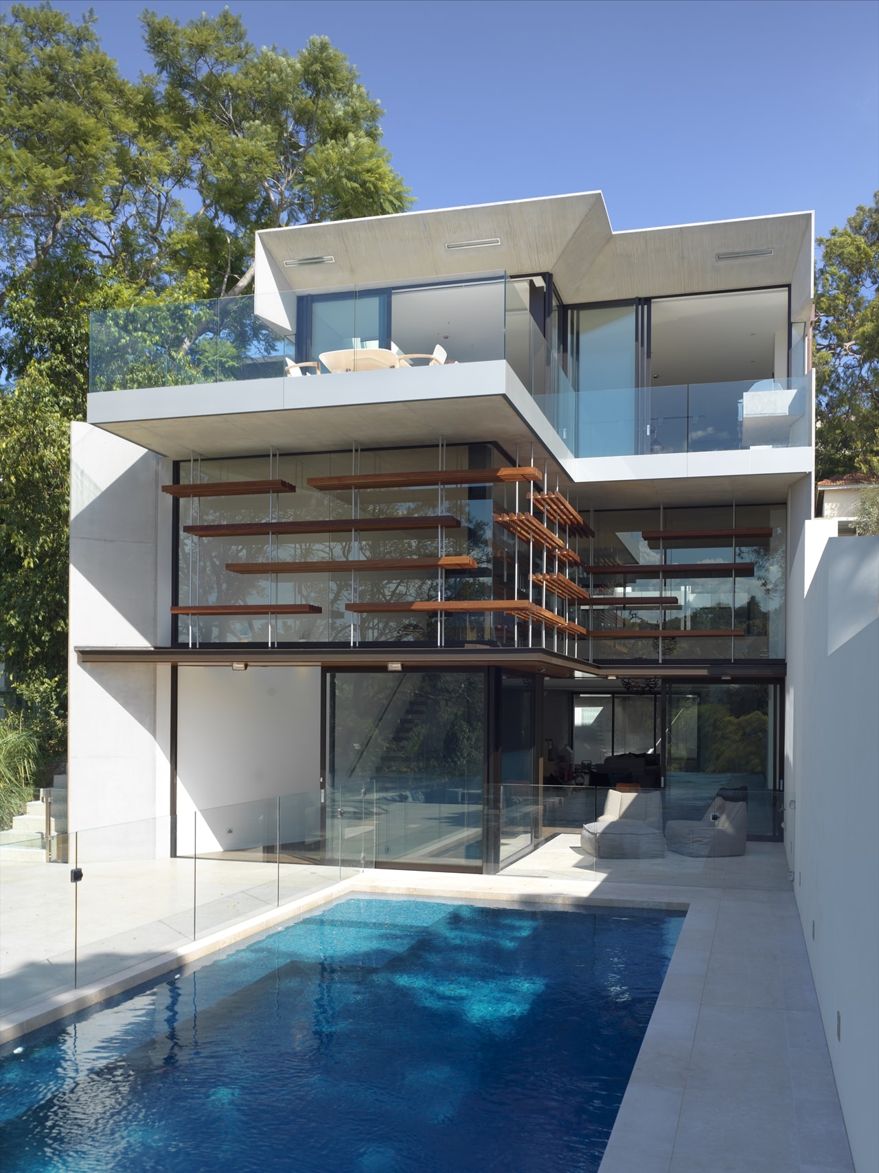 This House Design On Sloped Land Highlights All Benefits Of Hillside Homes Architecture Beast