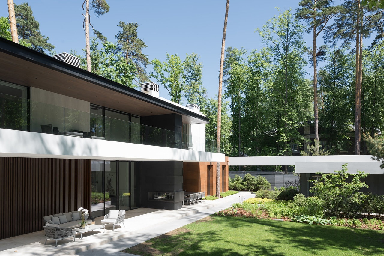 Outdoors of modern forest home designed by Alexandra Fedorova